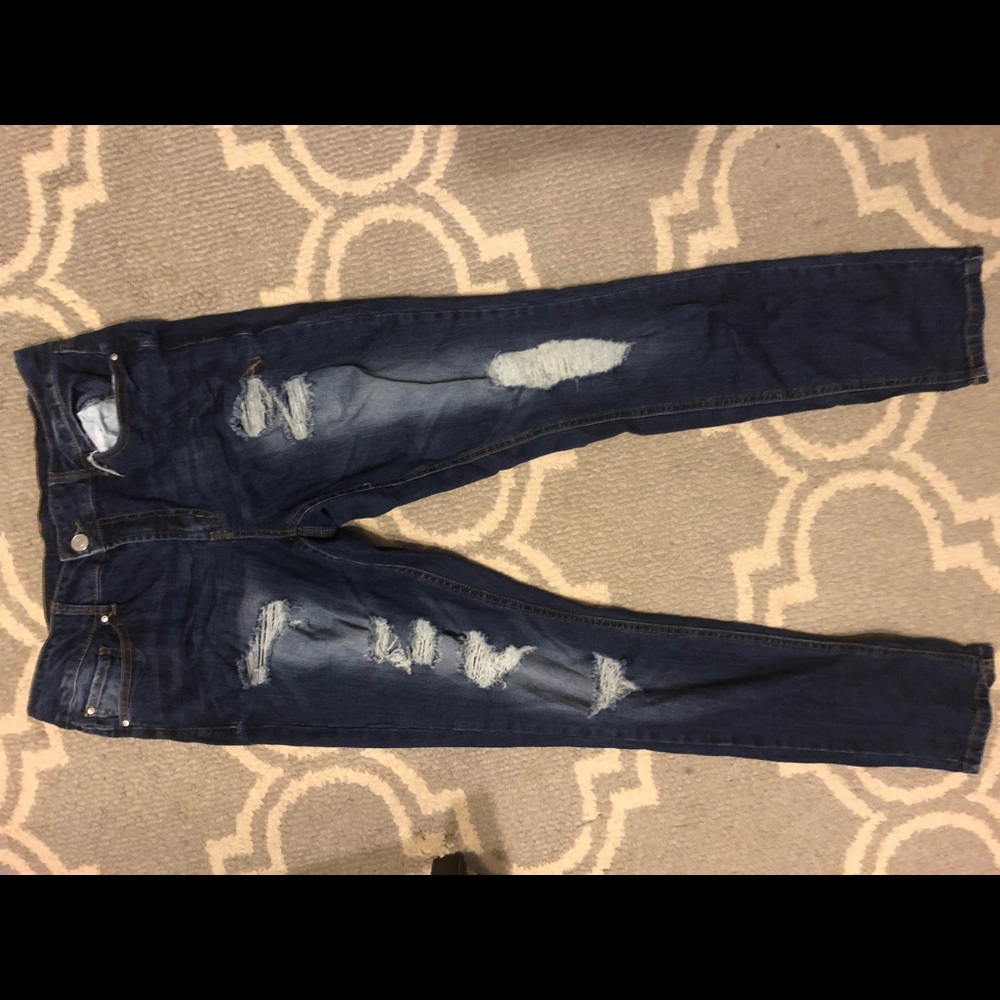 Never worn Distressed Blue Jeans